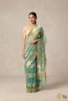 A Flourish of Primroses  Teal Blue Pure Kora Silk Net Banarasi Handloom Saree For Discount