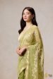 A Flourish of Primroses  Green Pure Kora Silk Net Banarasi Handloom Saree Sale